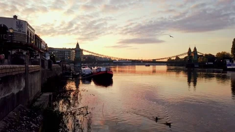 Motionlapse of the sunrise over the River Thames in Hammersmith, London Stock Footage