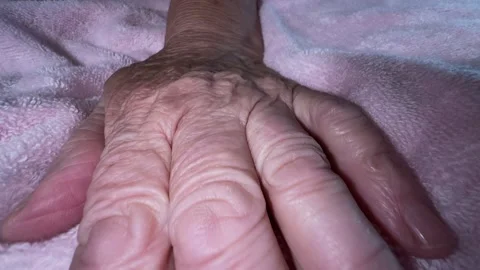 Motionless elderly hand on the towel Video stock 223511006