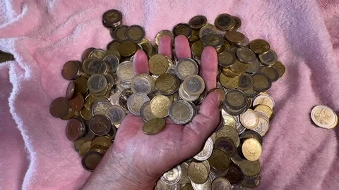 Motionless hand wrapped in coins Video stock 223862848