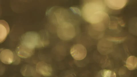 MotionVFX flickering circular bokeh yellow Video stock 201313601