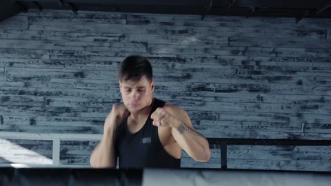 Motivated boxer practicing punches Stock Footage 108222589