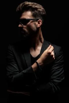 Motivated dramatic man looking to the side Stock Photos