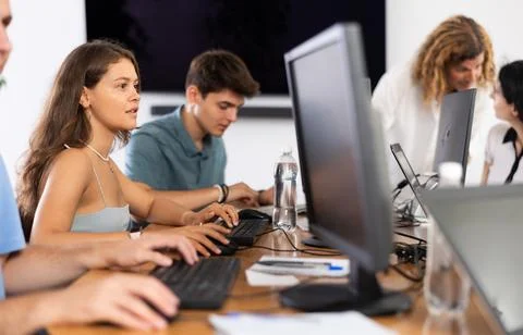 Motivated young female software developer working in IT startup Foto stock