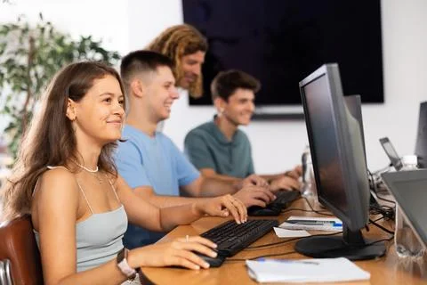 Motivated young female software developer working in IT startup 写真素材