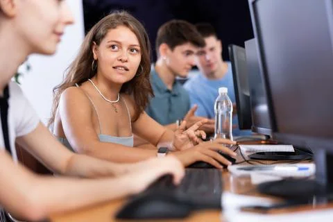 Motivated young female software developer working in IT startup Foto stock