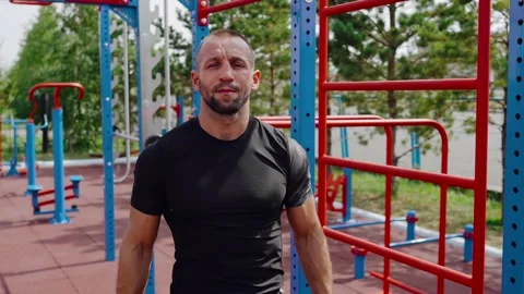Motivated young man getting ready for training. A young guy goes in for sports Stock Footage 135362702