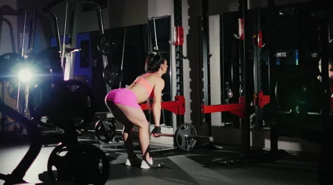 Motivation and commitment to the sport: athletic woman training in a hall in gym 스톡 동영상 66537766