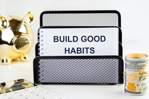 Motivational reminder development concept words BUILD GOOD HABITS in a notebo Stock Photos