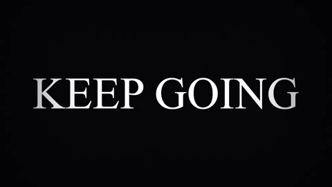 Motivational text Keep Going with glitch effect over black background Video stock 345620813
