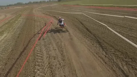 Moto cross chasing Fpv drone Video stock 221416267