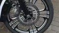 Moto wheel and engine, test drive at trade show, bike repair and maintenance HD Footage