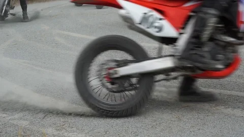 Motocross driver in action accelerating Stock Footage 108555475