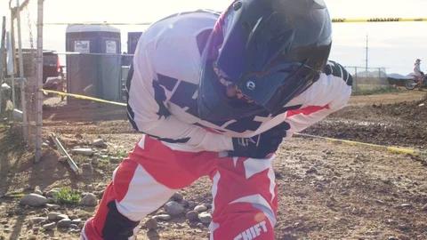 Motocross racer doing warm-up exercise Video stock 103414112