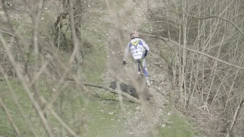 Motocross racer racing uphill, Genova, Italy, F-LOG Stock Footage