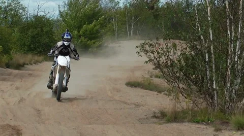 Motocross slow motion in rough sandy whoops Stock Footage 45331444