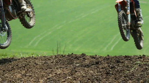 Motocrosser jumping Stock Footage 697055