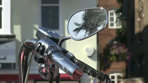 Motocycle handlebars palm tree reflection in mirror Stock Footage 36813788