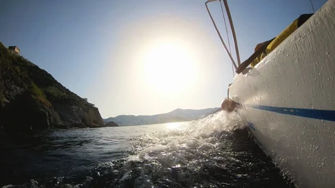 Motor boat breaking waves at sunset in the ocean action cam Video stock 100388018