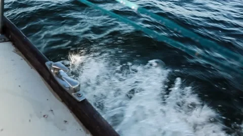 Motor boat cuts through the waves. View from the boat Stock Footage 64463887
