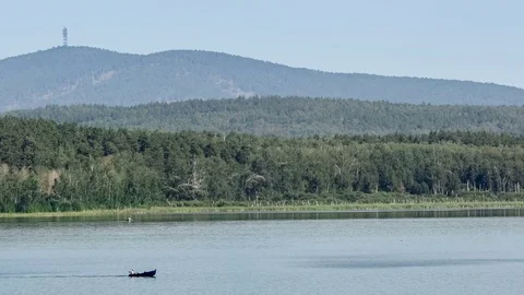 Motor boat rides on a mountain river. Place of meteorite fall. Chebarkul lake Stock-Footage 74075933