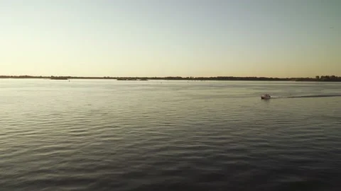 Motor boat in the setting sun Stock Footage 135119414