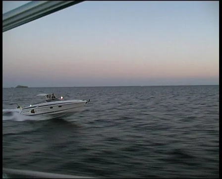 Motor boat at sunset Stock Footage 135391
