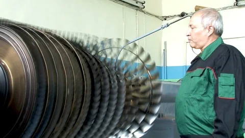 Motor compressor rotor balancing from Su-24 aircraft (fencer) on lathe. Stock Footage 123209998