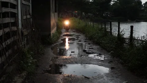 Motor Cycle with Front Light on Moving Towards the Viewer, Slow Motion, HD Stock Footage 82979931