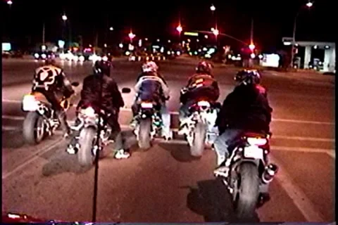 Motor Cycle Group at Red Light Stockbeeldmateriaal 7751754