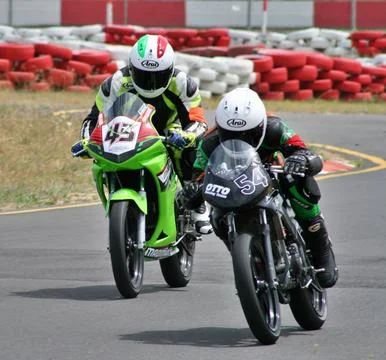 Motor-cycle Race Stock Photos