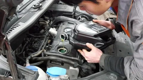 Motor engine oil change Stock Footage 60118767