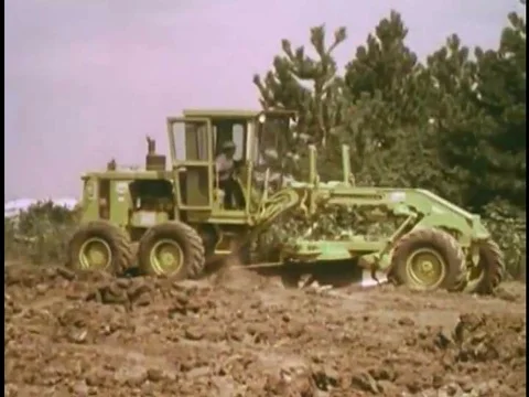 A motor grader breaks down and the operator discovers the engine has a cracked Stock Footage 79463884