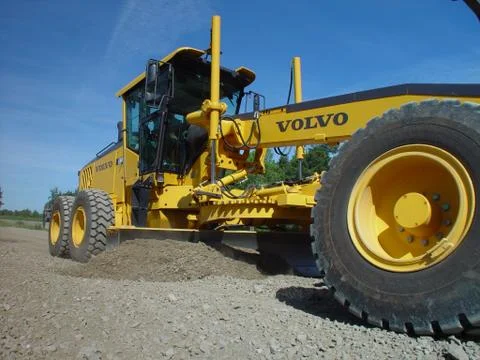 Motor grader construction machine Stock Photos