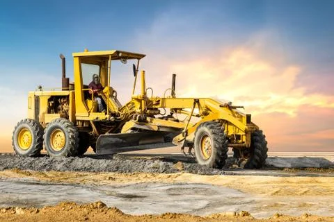 Motor grader on ground Stock Photos