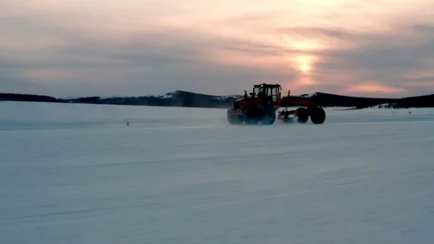 Motor Grader Working Through Powder Snow at Sunset Vídeo Stock 344955003