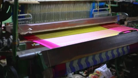 Motor loom machine making a indian traditional saree Stock Footage 240317650