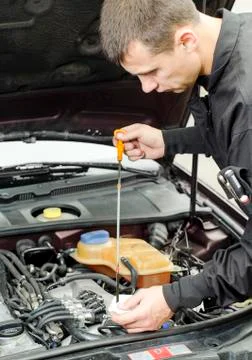 Motor oil checking Stock Photos