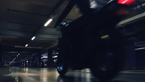 Motor racing in the underground parking. Need for Speed. Stock Footage 117227371