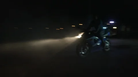 Motor rider at night Stock Footage 87706357