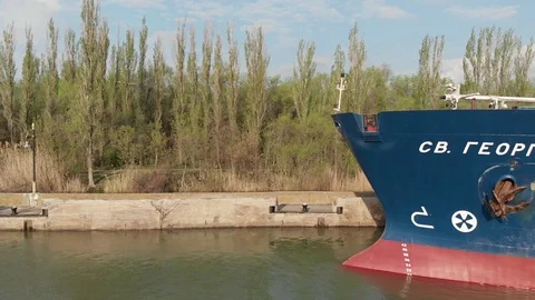 Motor ship with its nose cuts water. Cargo transportation by water. Stock Footage 111383658