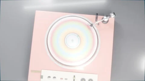 Motor starting pink deck spinning vinyl rings on table, arm stylus moving Stock Footage 337885960