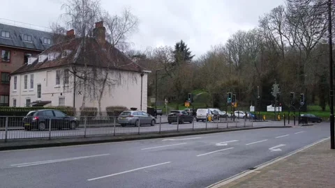 Motor Traffic Passing Through A Major Road Junction On Green Lights Stock Footage 162305219