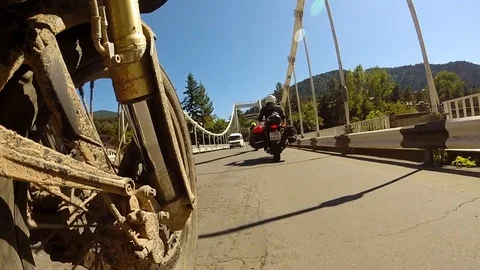Motorbike driving fast down the streets Stock Footage 88558997