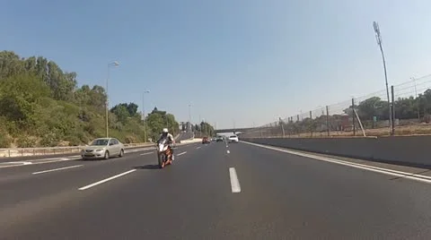 Motorbike motorcycle Tel Aviv city rider riding biker driver drive driving Stock Footage