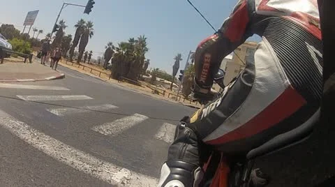 Motorbike motorcycle Tel Aviv city rider riding biker driver drive driving Stock Footage