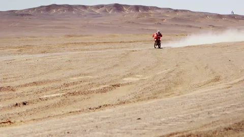 Motorbikes driving on the Gobi Stock Footage 235106591