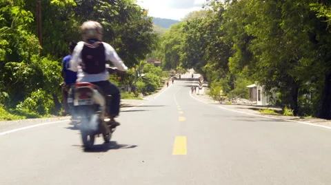Motorbikes overtaking on sunny road. Stock Footage 44175832