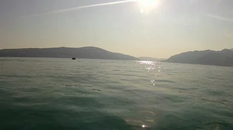 Motorboat heading into the sun Stock-Footage 18168907