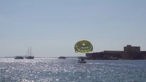 Motorboat With Parachute Preparing Parasailing 動画素材 72379916