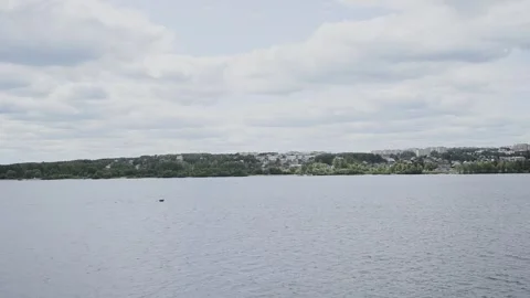 A motorboat sails down the river, slow motion video Stock Footage 328299242